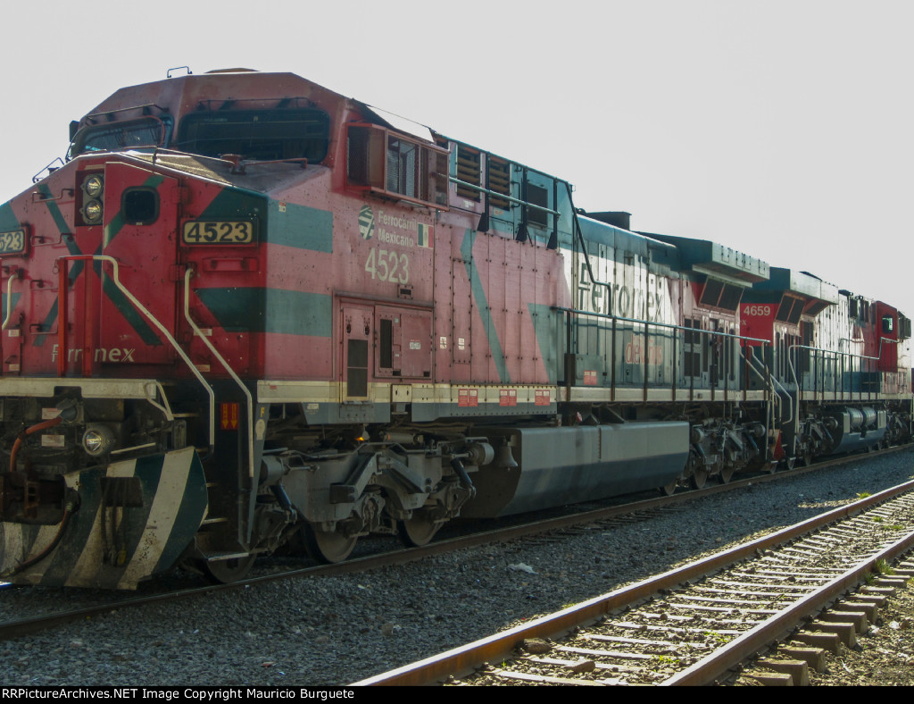 FXE AC4400 Locomotive leading a train